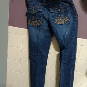 Girls, kids blue jeans, slim 8. Designer back pocket.Delgado